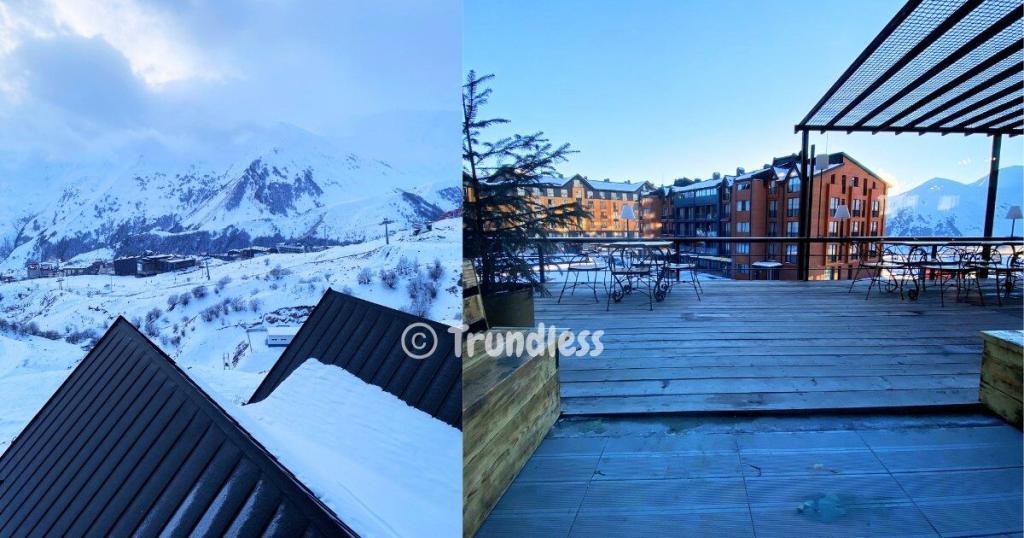 Split image: Left shows snow-covered rooftops and mountains in the distance; right features a wooden terrace with seating overlooking buildings and mountains.