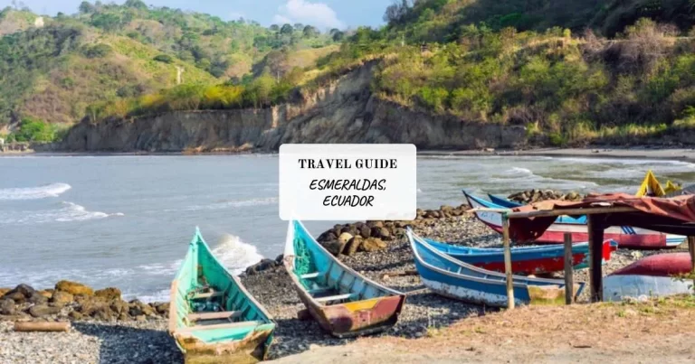 Small wooden boats on a rocky shore with hills in the background, under a sign reading "Travel Guide: Esmeraldas, Ecuador.